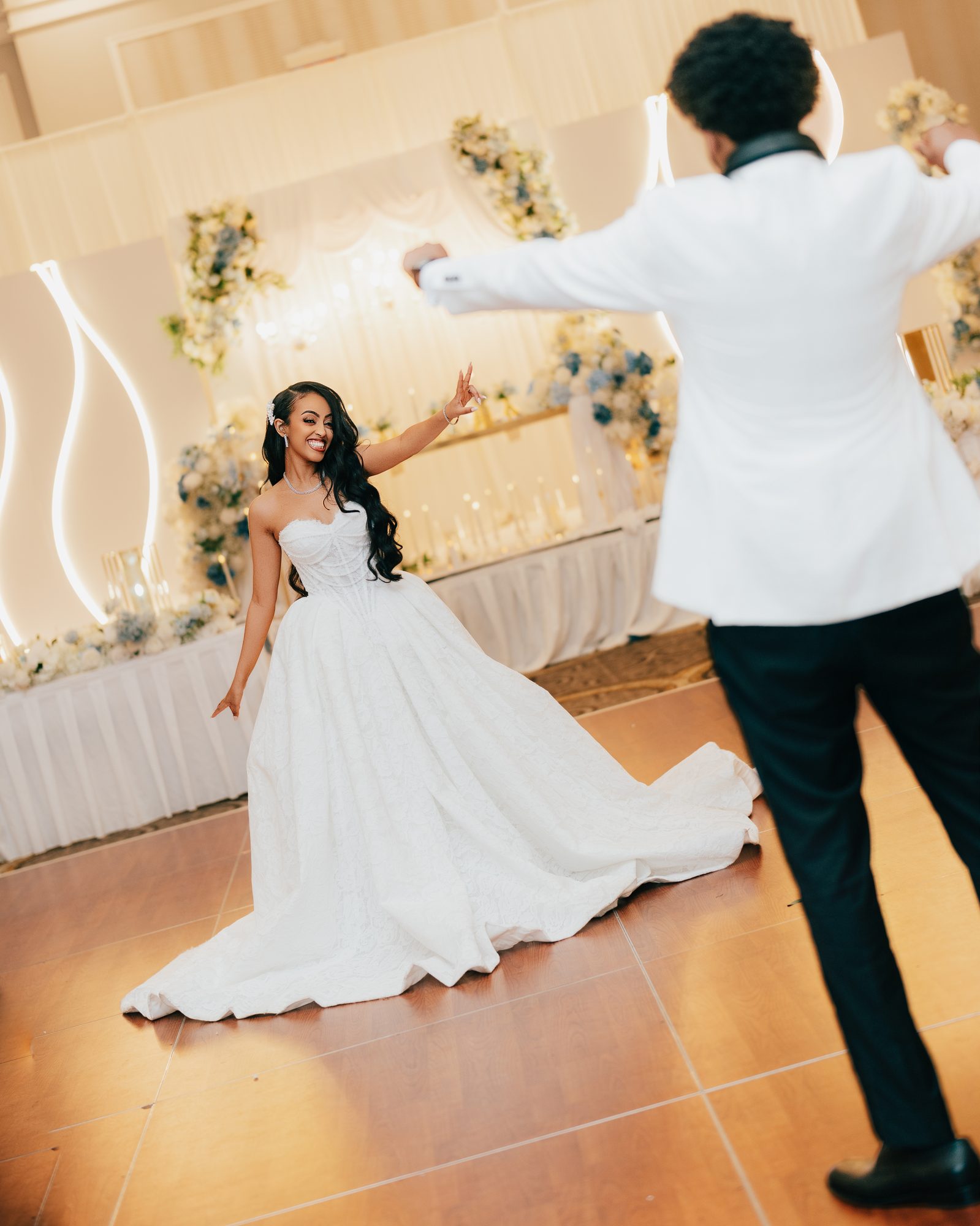 Bride and groom dancing together at their wedding reception